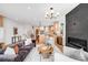 Spacious living room featuring an open-concept design with stylish furniture and lighting at 2926 S Cherokee St, Englewood, CO 80110