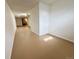 Basement featuring neutral flooring and white walls with updated electrical outlets at 414 S Nelson S St, Lakewood, CO 80226