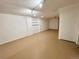 Large basement featuring neutral color walls, flooring and recessed lights at 414 S Nelson S St, Lakewood, CO 80226