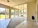 Sunroom featuring sliding glass doors and backyard view at 414 S Nelson S St, Lakewood, CO 80226