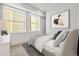 Spacious bedroom with a queen bed and ample natural light at 1418 Pierce St, Lakewood, CO 80214