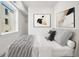 Bright bedroom with a queen-size bed and large windows at 1418 Pierce St, Lakewood, CO 80214