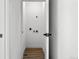 Convenient laundry room with wood-look flooring at 1418 Pierce St, Lakewood, CO 80214