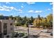 View of the tree-lined street and surrounding neighborhood at 1418 Pierce St, Lakewood, CO 80214