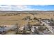 Aerial view of property showing house and surrounding land at 540 Hickory St, Hudson, CO 80642