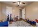 A bedroom featuring hardwood floors and lots of toys at 1100 E Harvey St, Castle Rock, CO 80108