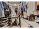 Walk in closet with custom built in shelving and hardwood floors at 1100 E Harvey St, Castle Rock, CO 80108