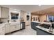 Modern kitchen with stainless steel appliances, a kitchen island, and ample counter space at 1100 E Harvey St, Castle Rock, CO 80108
