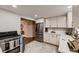 Stylish kitchen with stainless steel appliances and modern cabinetry and an open design at 1100 E Harvey St, Castle Rock, CO 80108