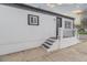 Charming home exterior boasts a fresh coat of paint and a welcoming front porch at 14701 E Colfax Ave # A5, Aurora, CO 80011