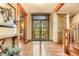 Bright entryway with hardwood floors and French doors at 1138 County Road 65, Evergreen, CO 80439