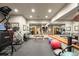 Home gym with various equipment and mirrors at 1138 County Road 65, Evergreen, CO 80439