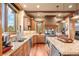 Large kitchen with granite countertops and stainless steel appliances at 1138 County Road 65, Evergreen, CO 80439