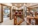 Upstairs hallway with a built-in desk and views at 1138 County Road 65, Evergreen, CO 80439