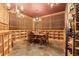 Spacious wine cellar with a tasting table at 1138 County Road 65, Evergreen, CO 80439