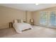 Comfortable main bedroom with private access to a patio at 3250 S Oneida Way, Denver, CO 80224