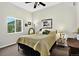 Cozy bedroom with large window and ample natural light at 30889 Manitoba Dr, Evergreen, CO 80439