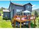 A beautiful two-story home featuring a spacious deck, perfect for outdoor entertaining and relaxation at 30889 Manitoba Dr, Evergreen, CO 80439