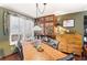 Bright dining area with stylish shutters and a rustic cabinet at 29857 Park Village Dr, Evergreen, CO 80439
