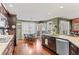 Spacious kitchen features granite countertops, stainless steel appliances, and a cozy breakfast nook at 29857 Park Village Dr, Evergreen, CO 80439