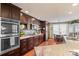 Modern kitchen with stainless steel appliances and granite countertops at 29857 Park Village Dr, Evergreen, CO 80439