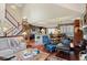 Spacious living room with an open floor plan and staircase at 29857 Park Village Dr, Evergreen, CO 80439