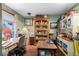 Functional home office area featuring a built-in cabinet and plenty of natural light at 29857 Park Village Dr, Evergreen, CO 80439