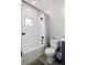 Modern bathroom showcasing a tiled shower and tub combination with sleek fixtures, complemented by a tiled floor at 4184 Kalamath St, Denver, CO 80211