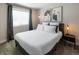 Bedroom with a large window, neutral walls, and modern decor at 4184 Kalamath St, Denver, CO 80211