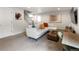 Spacious basement living room with a comfortable sofa, tv, desk and stairway at 4184 Kalamath St, Denver, CO 80211