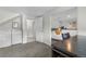 Basement area featuring a bedroom, laundry area, and a work-from-home space at 2075 Oakland St, Aurora, CO 80010