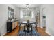 Inviting dining room with modern light fixture and view of the outdoors at 2075 Oakland St, Aurora, CO 80010