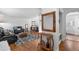 Bright living room featuring hardwood floors, stylish decor, and open layout at 2075 Oakland St, Aurora, CO 80010