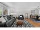 Cozy living room and dining area with hardwood floors and natural light at 2075 Oakland St, Aurora, CO 80010