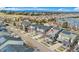 Bird's eye view of a neighborhood featuring a two-story home with solar panels on the roof at 9099 Prairie Sky Ln, Lone Tree, CO 80124