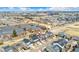 Aerial view of the home and surrounding neighborhood, offering a glimpse of the community at 9099 Prairie Sky Ln, Lone Tree, CO 80124