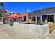 Exterior view of an urban restaurant with outdoor seating, modern design, and a lively atmosphere at 2527 W Dunkeld Pl, Denver, CO 80211