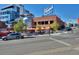 Street view of vibrant restaurant exterior with outdoor seating and architectural details at 2527 W Dunkeld Pl, Denver, CO 80211