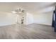 Spacious living room boasting sleek flooring and an open concept layout at 4940 E Donald Ave # 8, Denver, CO 80222