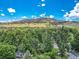 Picturesque aerial view of the home showcasing the lush greenery and mountain backdrop at 3135 11Th St, Boulder, CO 80304