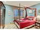 Stylish bedroom featuring a four-poster bed, bold colors, and ambient lighting for a cozy ambiance at 3135 11Th St, Boulder, CO 80304