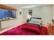 Cozy bedroom with a platform bed, natural light, and comfortable furniture offers relaxation at 3135 11Th St, Boulder, CO 80304