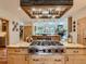 Spacious kitchen featuring modern stainless steel appliances and a large center island with a cooktop at 3135 11Th St, Boulder, CO 80304
