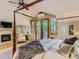 Spacious main bedroom with hardwood floors, a fireplace, and a sitting area with a view at 3135 11Th St, Boulder, CO 80304