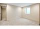 Spacious basement bedroom with neutral carpeting at 2325 S High St, Denver, CO 80210
