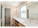 Contemporary bathroom with double vanity and a separate shower at 2325 S High St, Denver, CO 80210