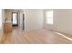 Bright bedroom with wood flooring and access to patio at 2325 S High St, Denver, CO 80210