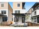 Modern townhome with covered patio and private yard at 2325 S High St, Denver, CO 80210