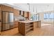 Modern kitchen with stainless steel appliances and an island at 2325 S High St, Denver, CO 80210