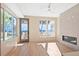 Bright living room featuring a fireplace and hardwood floors at 2325 S High St, Denver, CO 80210